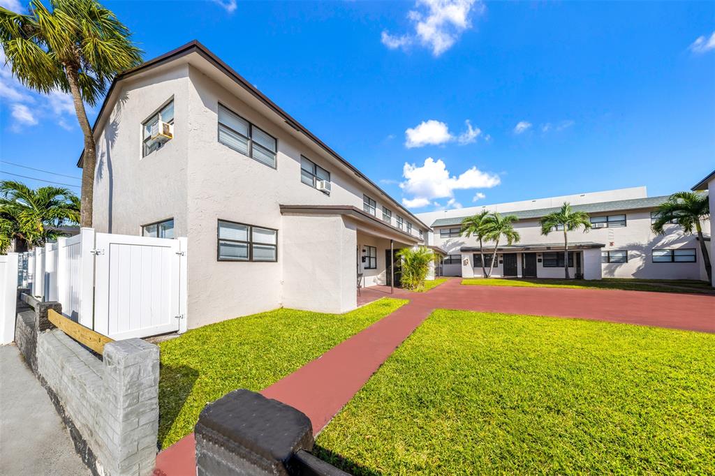 20 Northwest 7th Avenue Pompano Beach, FL 33060 - Photo 21 of 22 a view of a house with backyard and sitting area