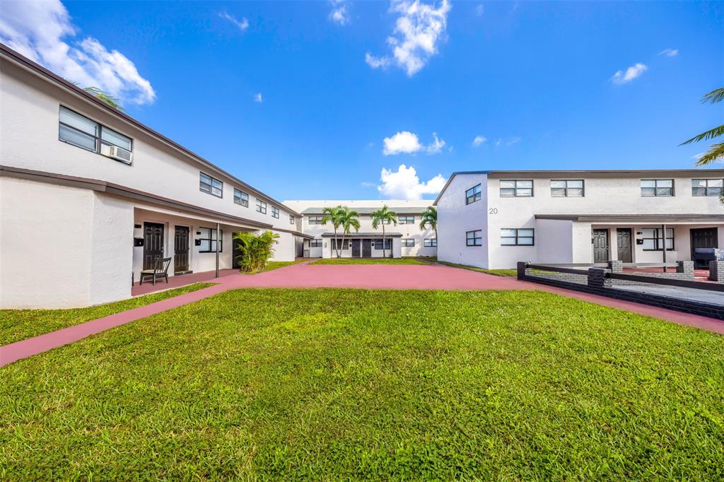 20 Northwest 7th Avenue Pompano Beach, FL 33060 - Photo 22 of 22 a view of a house with a yard porch and sitting area