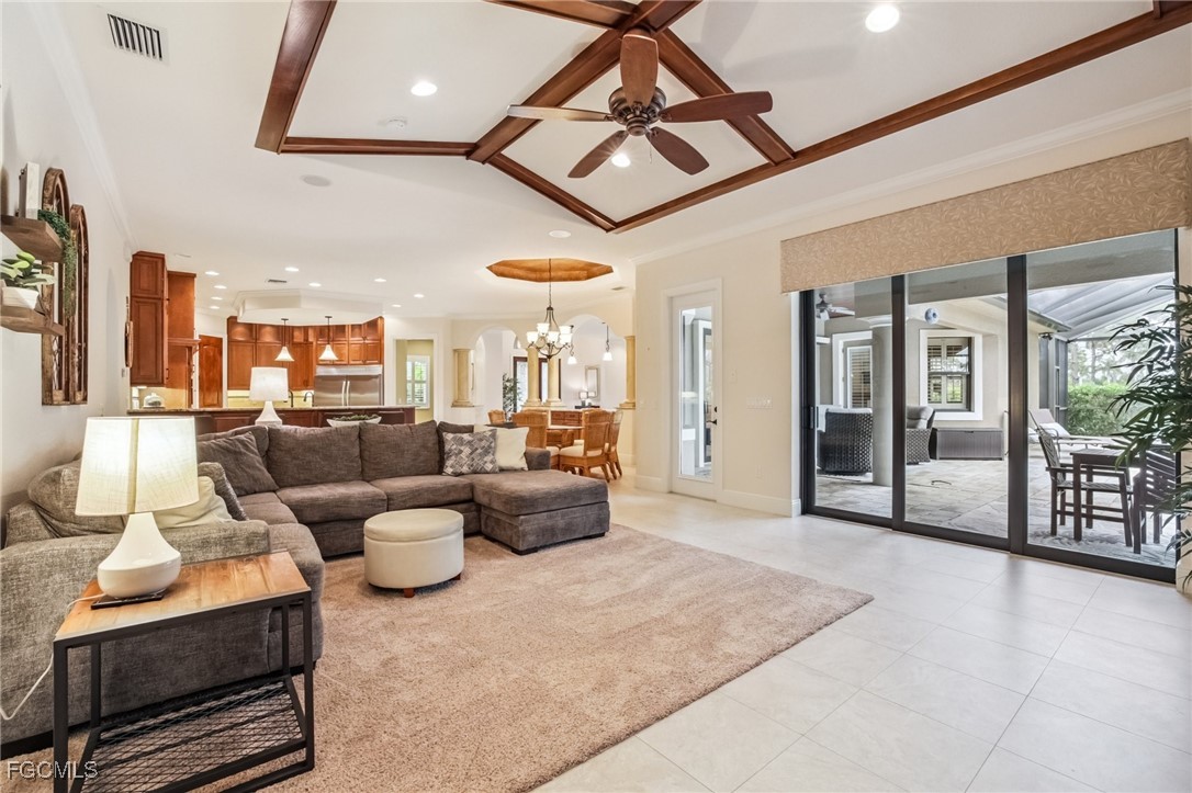 6041 Calusa Rdg Trail Bokeelia, FL 33922 - Photo 11 of 44 a living room with furniture and a view of kitchen