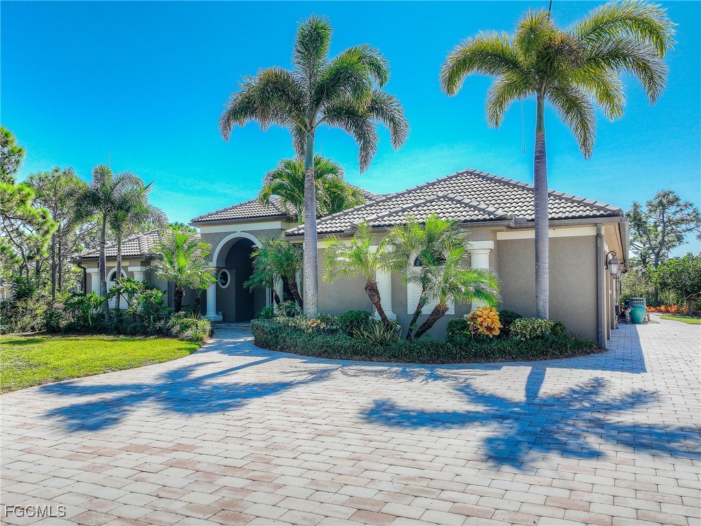 6041 Calusa Rdg Trail Bokeelia, FL 33922 - Photo 2 of 44 a view of outdoor space yard and swimming pool