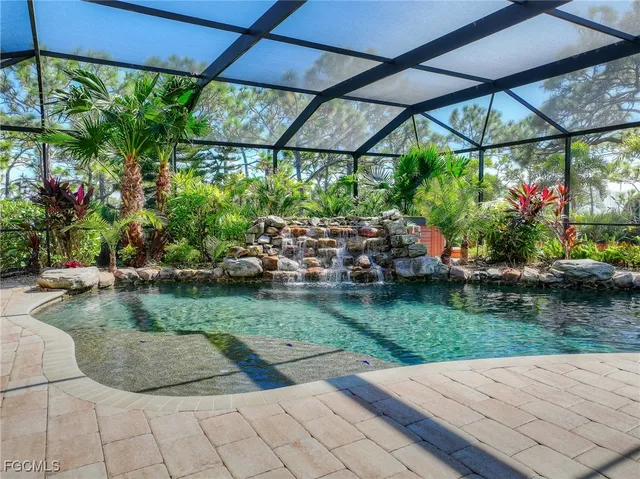 a view of a couches in patio and a yard