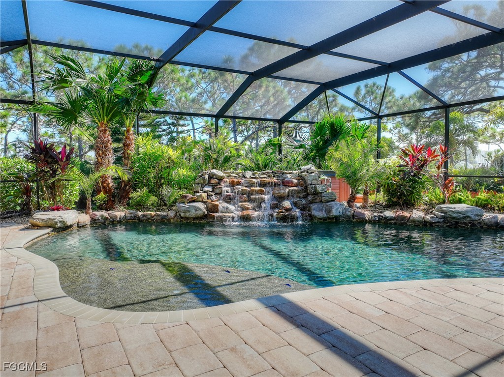 6041 Calusa Rdg Trail Bokeelia, FL 33922 - Photo 4 of 44 a view of a couches in patio and a yard