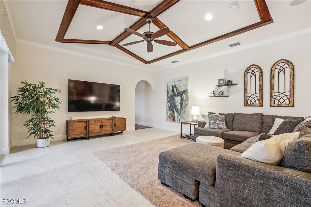 6041 Calusa Rdg Trail Bokeelia, FL 33922 - Photo 10 of 44 a living room with furniture and a flat screen tv