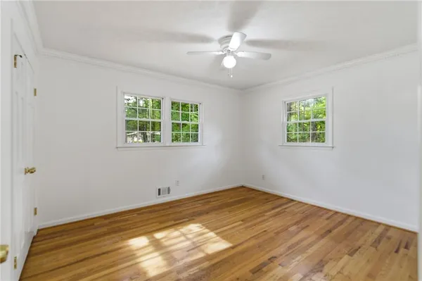 a view of a room with a large window