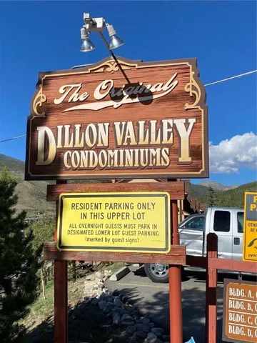 a sign on a pole on a street