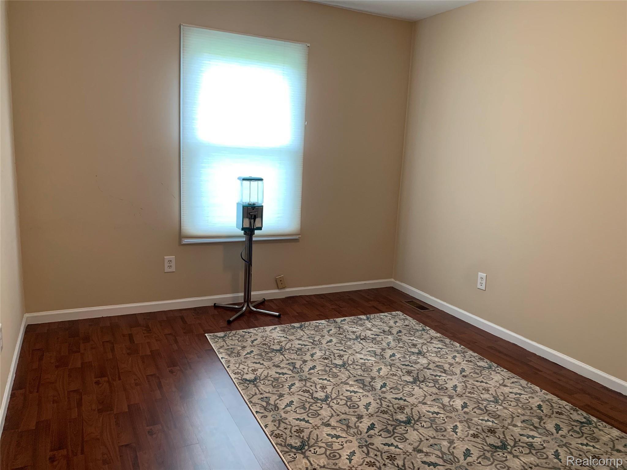 57260 12 Mile Road New Hudson, MI 48165 - Photo 18 of 22 upstairs bed3.jpg