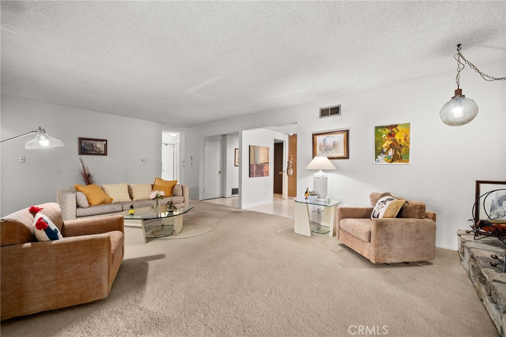 19514 Enslow Drive Carson, CA 90746 - Photo 25 of 51 a living room with furniture and wooden floor