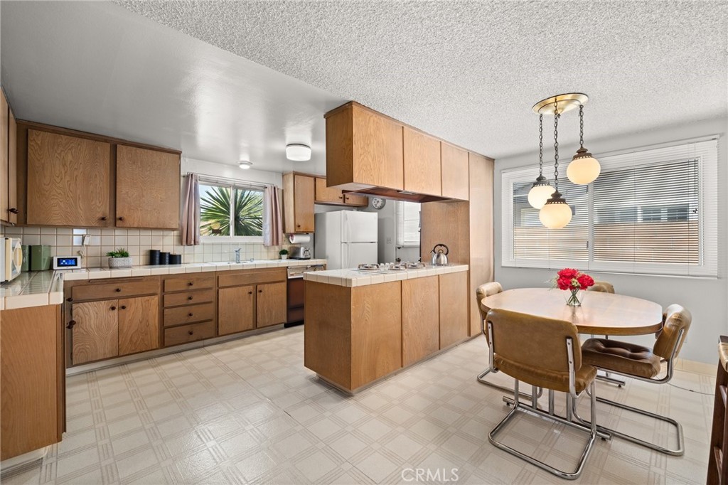 19514 Enslow Drive Carson, CA 90746 - Photo 30 of 51 a kitchen with a sink cabinets and window