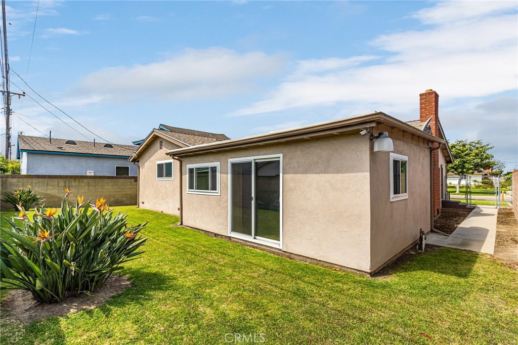 19514 Enslow Drive Carson, CA 90746 - Photo 4 of 51 a view of a house with a yard