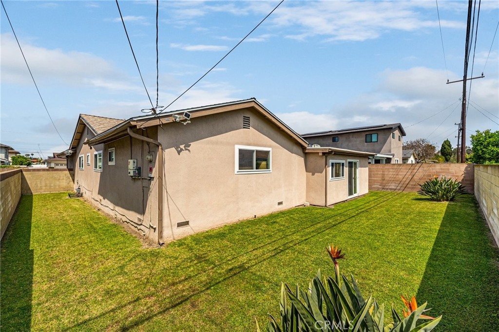 19514 Enslow Drive Carson, CA 90746 - Photo 6 of 51 a front view of a house with a yard