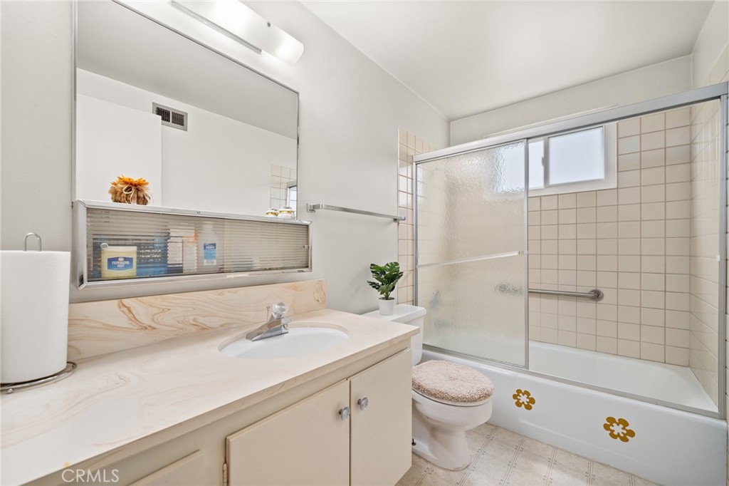 19514 Enslow Drive Carson, CA 90746 - Photo 9 of 51 a bathroom with a sink a toilet and shower