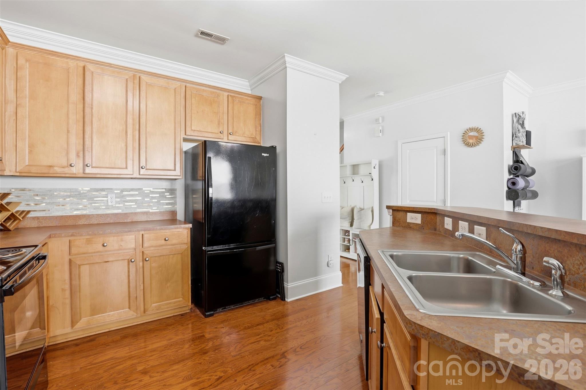 532 Bent Leaf Court Fort Mill, SC 29708 - Photo 9 of 27 a kitchen with granite countertop a refrigerator and a sink