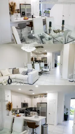 a kitchen with stainless steel appliances kitchen island granite countertop a sink and counter space