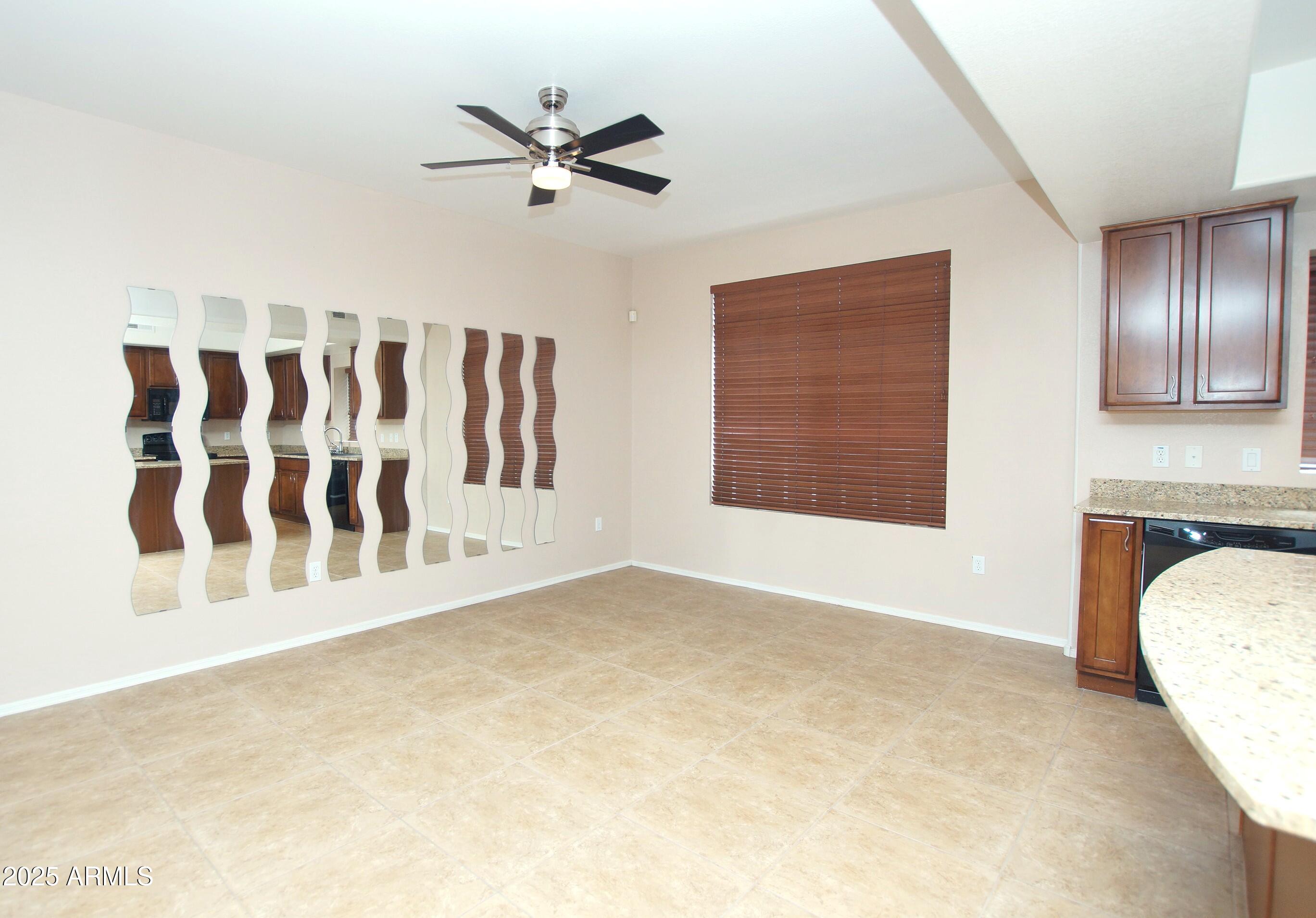 2150 West Alameda Road, Unit 1398 Phoenix, AZ 85085 - Photo 12 of 29 a view of an empty room with a window