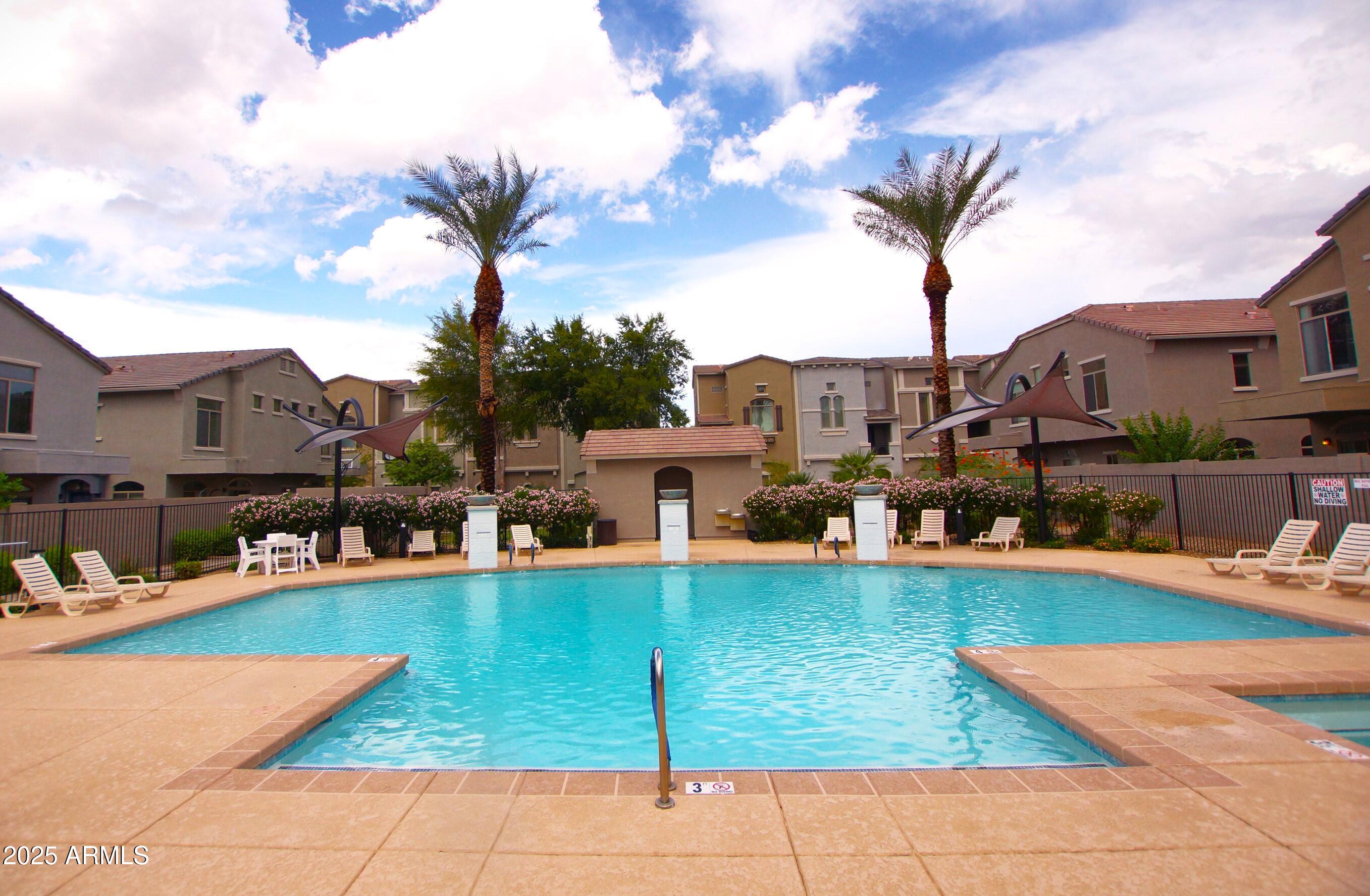 2150 West Alameda Road, Unit 1398 Phoenix, AZ 85085 - Photo 10 of 29 a view of a house with swimming pool