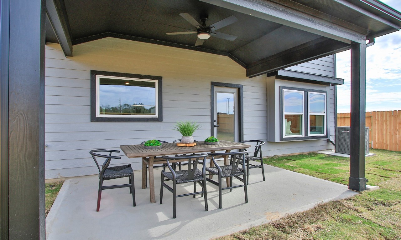 4028 Colony Riv Rock Boulevard Pinehurst, TX 77362 - Photo 21 of 21 a view of an outside dining space with furniture