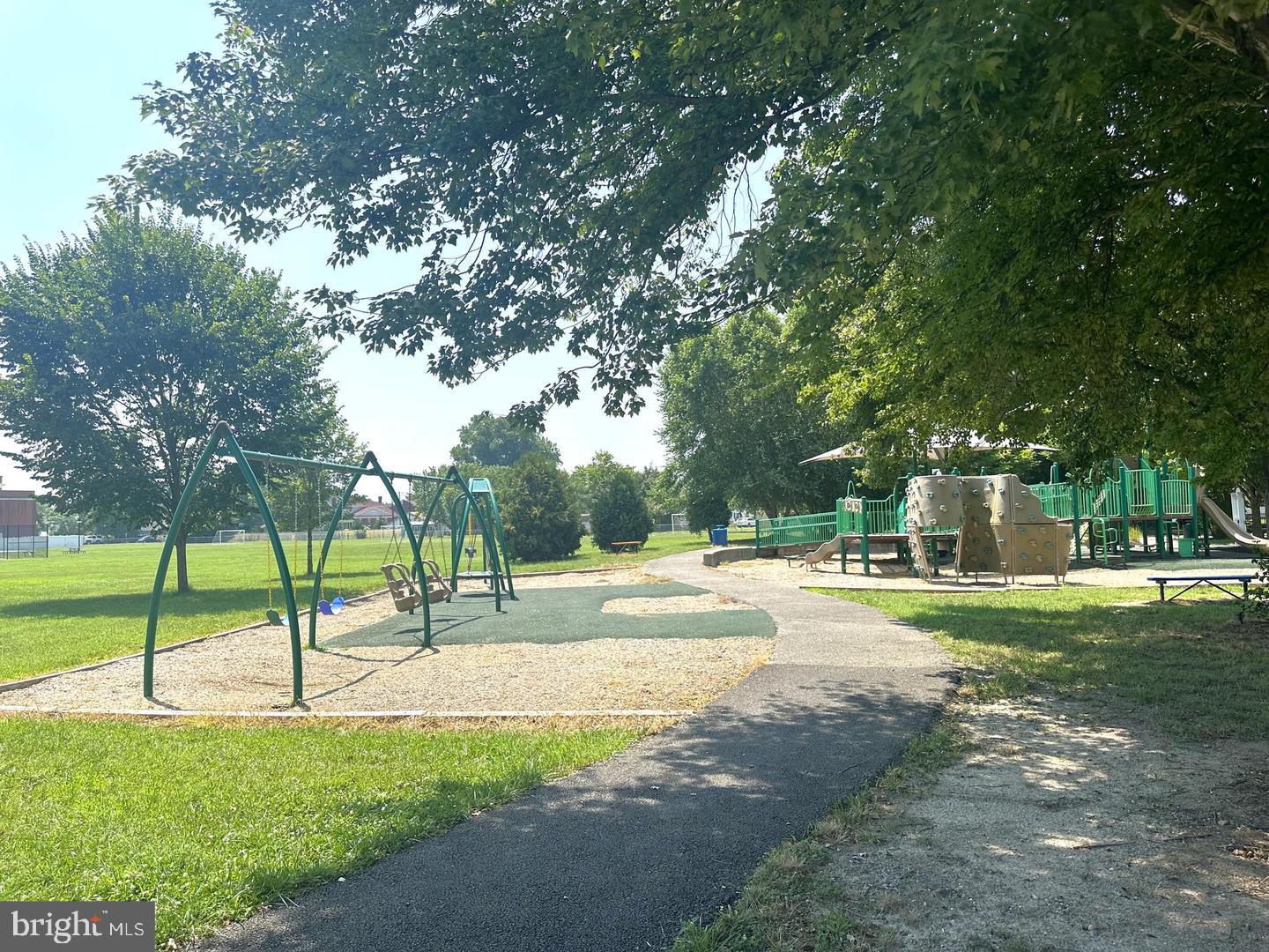 2 North Main Street Greensboro, MD 21639 - Photo 13 of 19 a view of a park with swings and slides