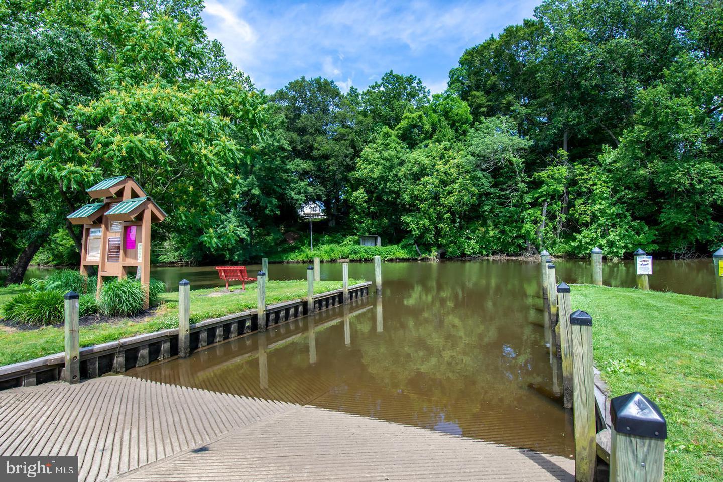 2 North Main Street Greensboro, MD 21639 - Photo 14 of 19 a wooden bridge near lake