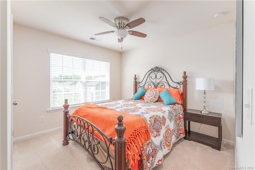 78094 Rillstone Drive Lancaster, SC 29720 - Photo 17 of 26 a bedroom with a bed and window
