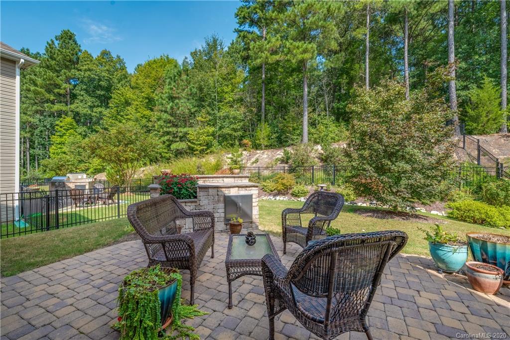 78094 Rillstone Drive Lancaster, SC 29720 - Photo 22 of 26 a view of a chairs and table in backyard