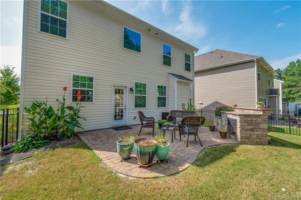 78094 Rillstone Drive Lancaster, SC 29720 - Photo 23 of 26 a backyard of a house with seating space