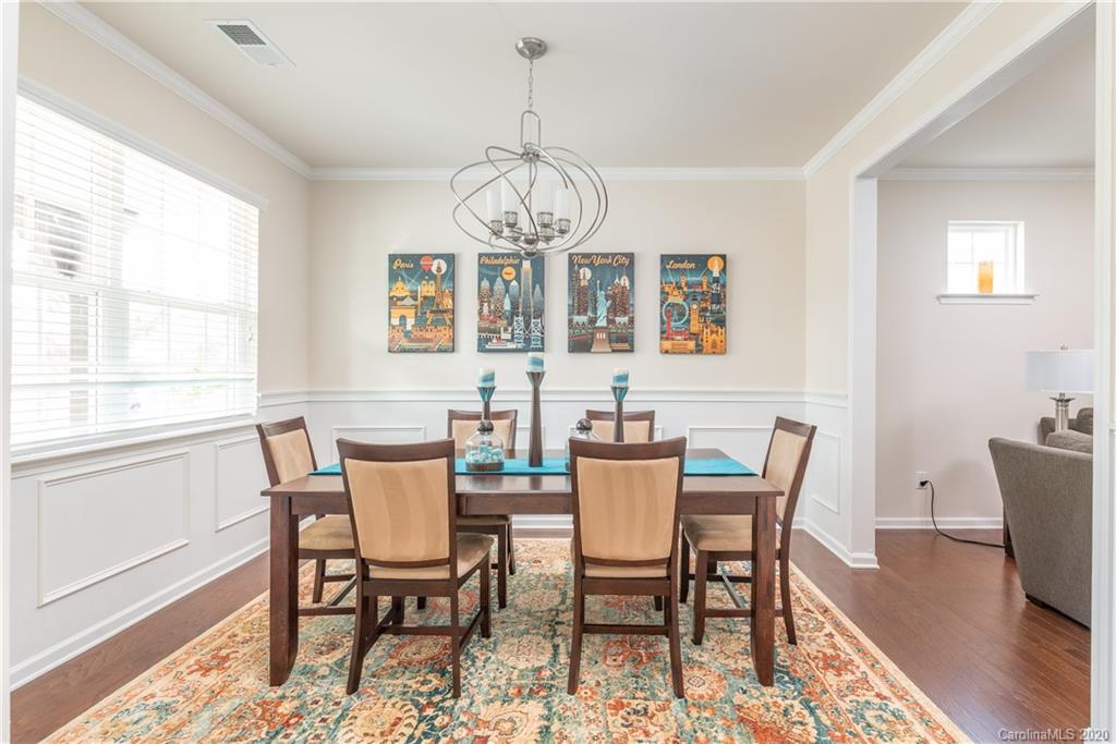 78094 Rillstone Drive Lancaster, SC 29720 - Photo 6 of 26 a view of a dining room with furniture window and wooden floor