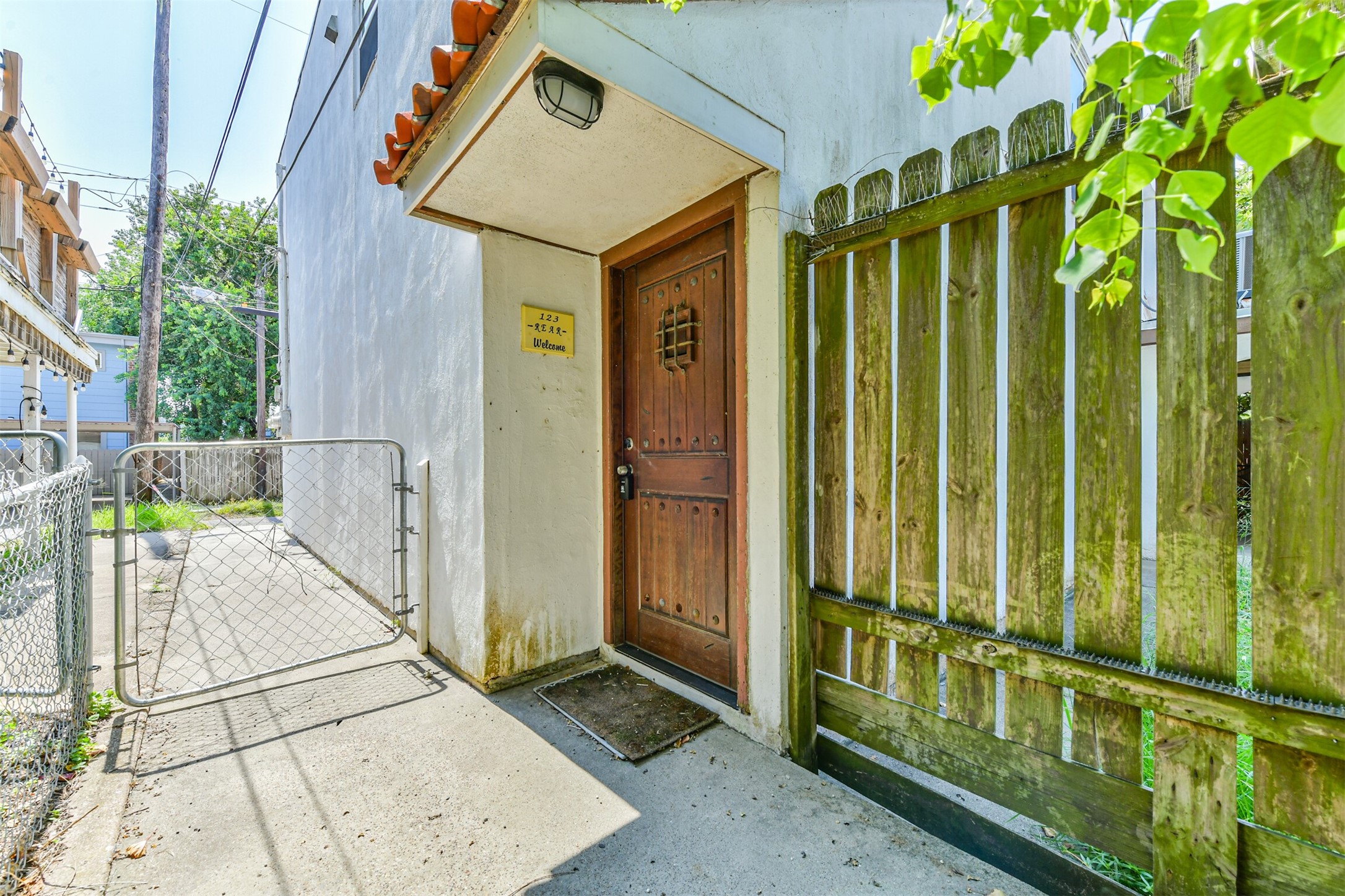 a front view of a house with a glass door
