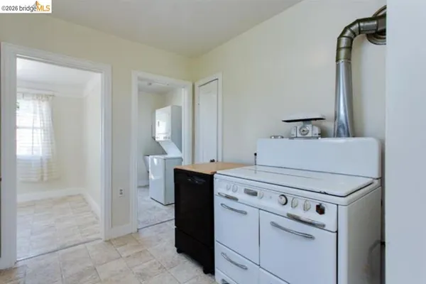 a utility room with washer and dryer