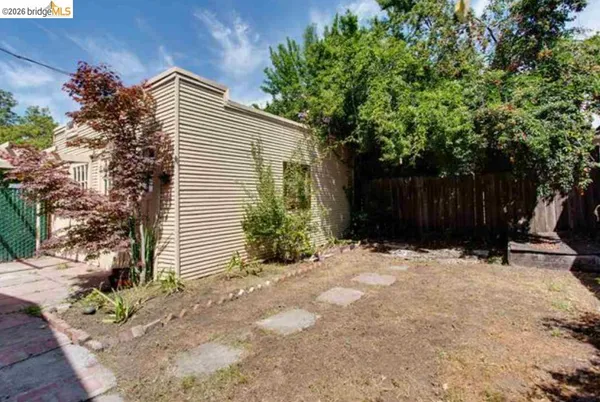 a backyard of a house with lots of green space