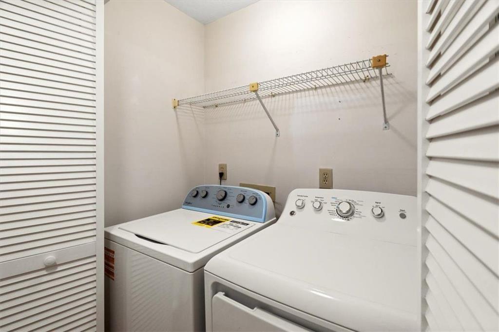 1411 Oakridge Circle Decatur, GA 30033 - Photo 17 of 26 a utility room with dryer and washer