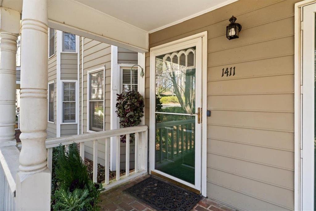 1411 Oakridge Circle Decatur, GA 30033 - Photo 3 of 26 front view of a house with a large window