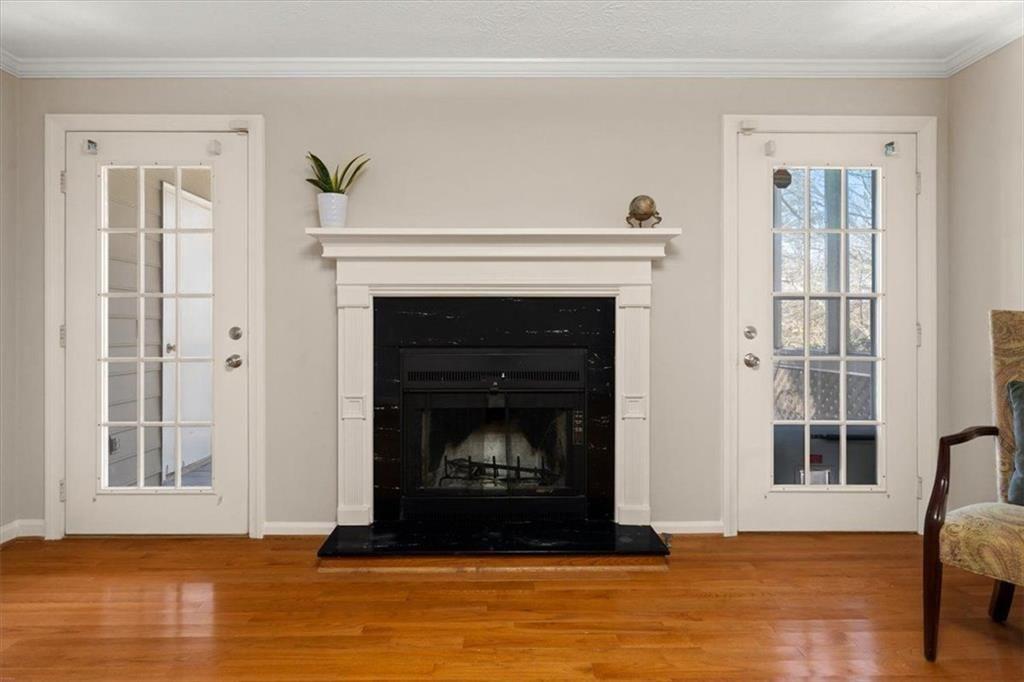 1411 Oakridge Circle Decatur, GA 30033 - Photo 6 of 26 a living room with a fireplace and a fireplace