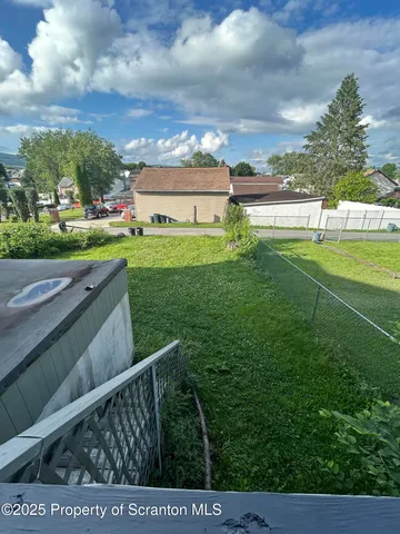 a view of a hallway with entryway