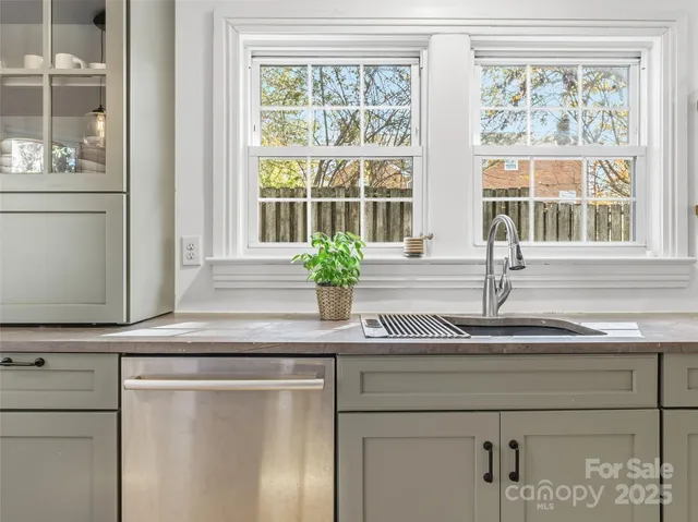 a kitchen with appliances and cabinets