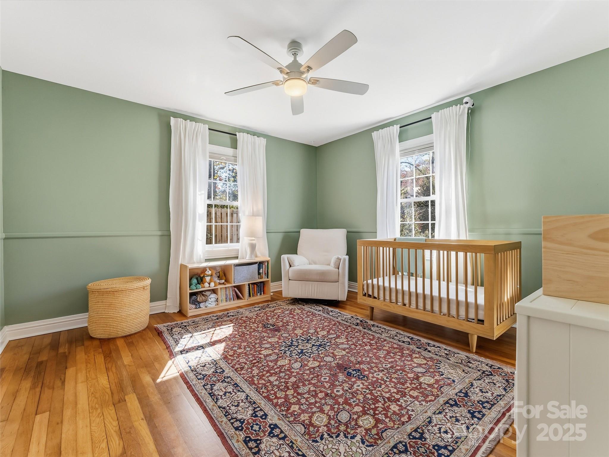 140 Lakeview Avenue Brevard, NC 28712 - Photo 22 of 37 a living room with furniture and a rug