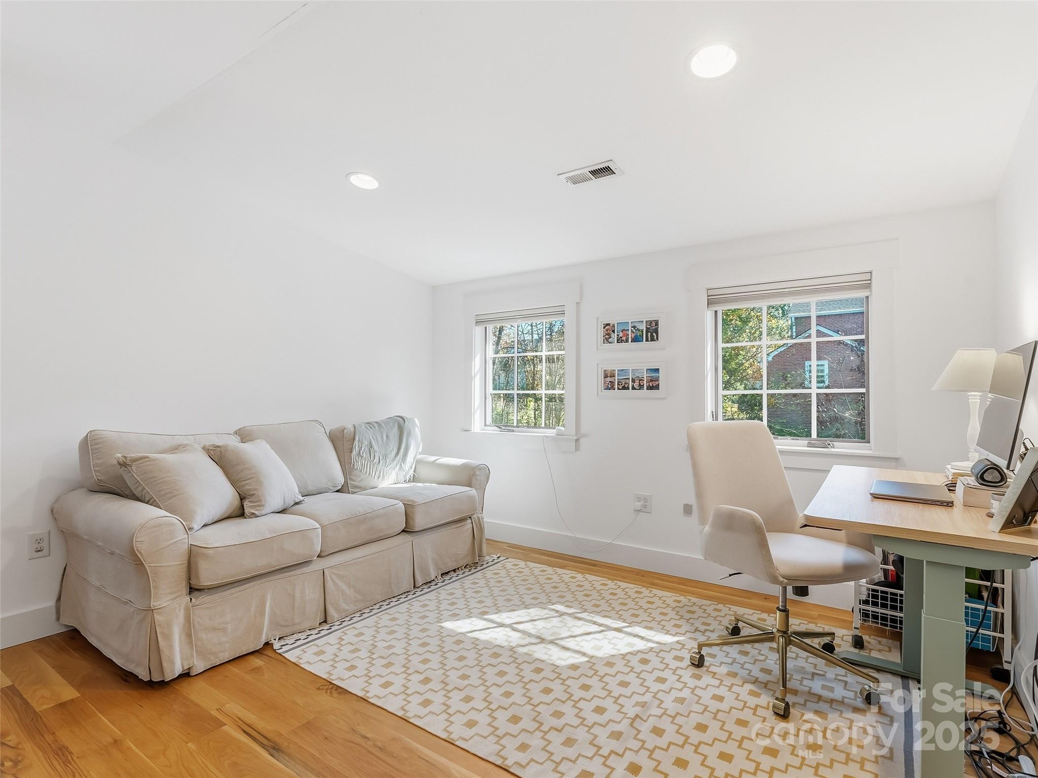 140 Lakeview Avenue Brevard, NC 28712 - Photo 24 of 37 a living room with furniture and a window