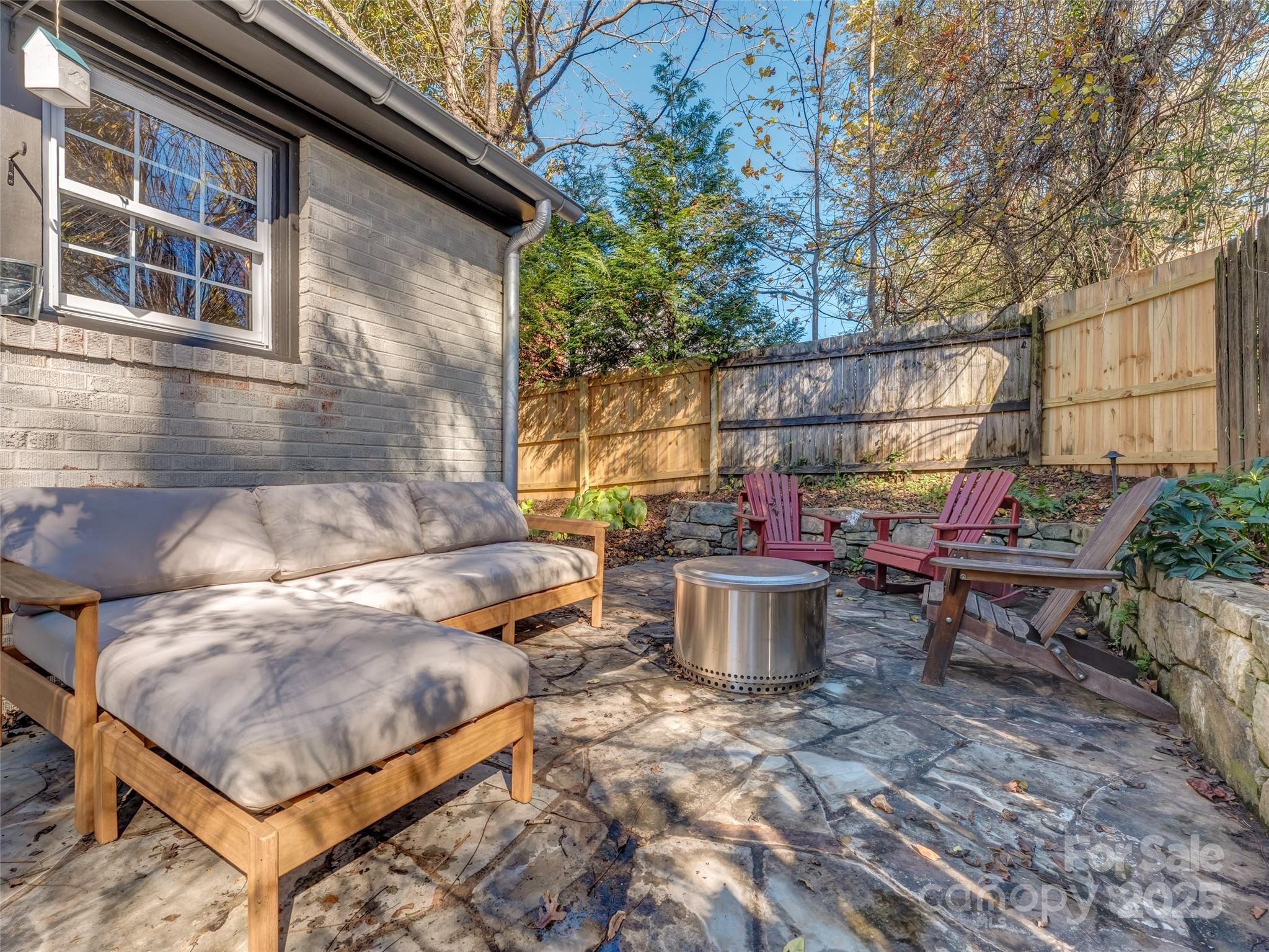 140 Lakeview Avenue Brevard, NC 28712 - Photo 34 of 37 a view of a backyard with sitting area