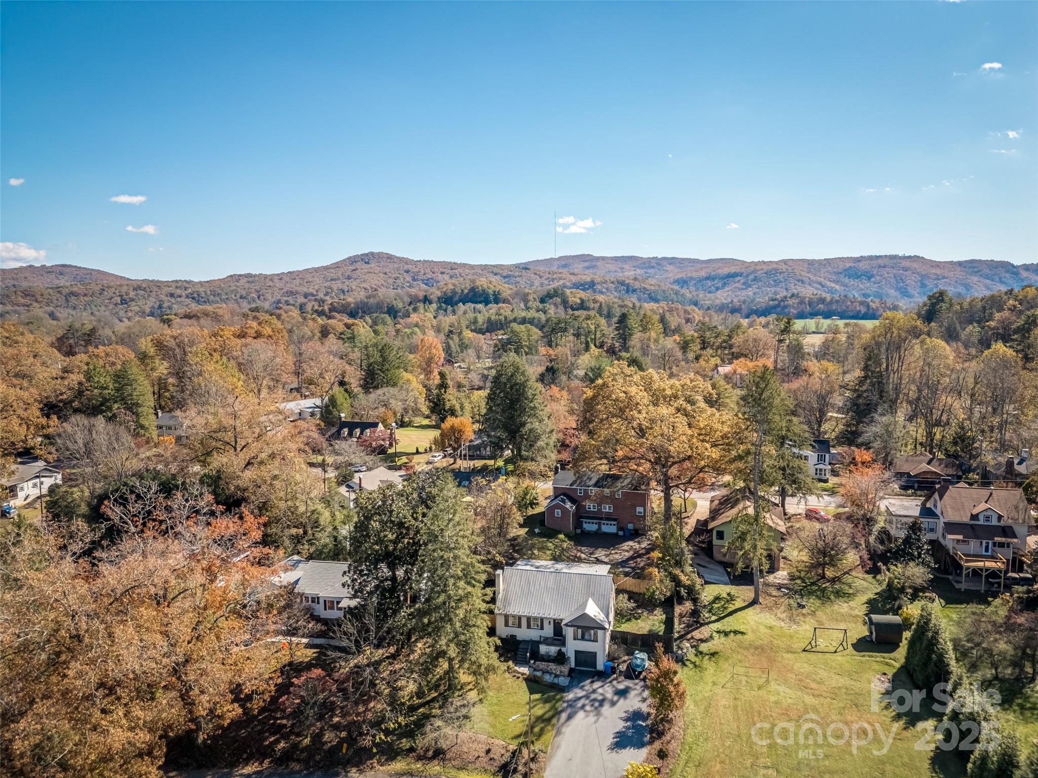 140 Lakeview Avenue Brevard, NC 28712 - Photo 4 of 37 an aerial view of residential house and sandy dunes