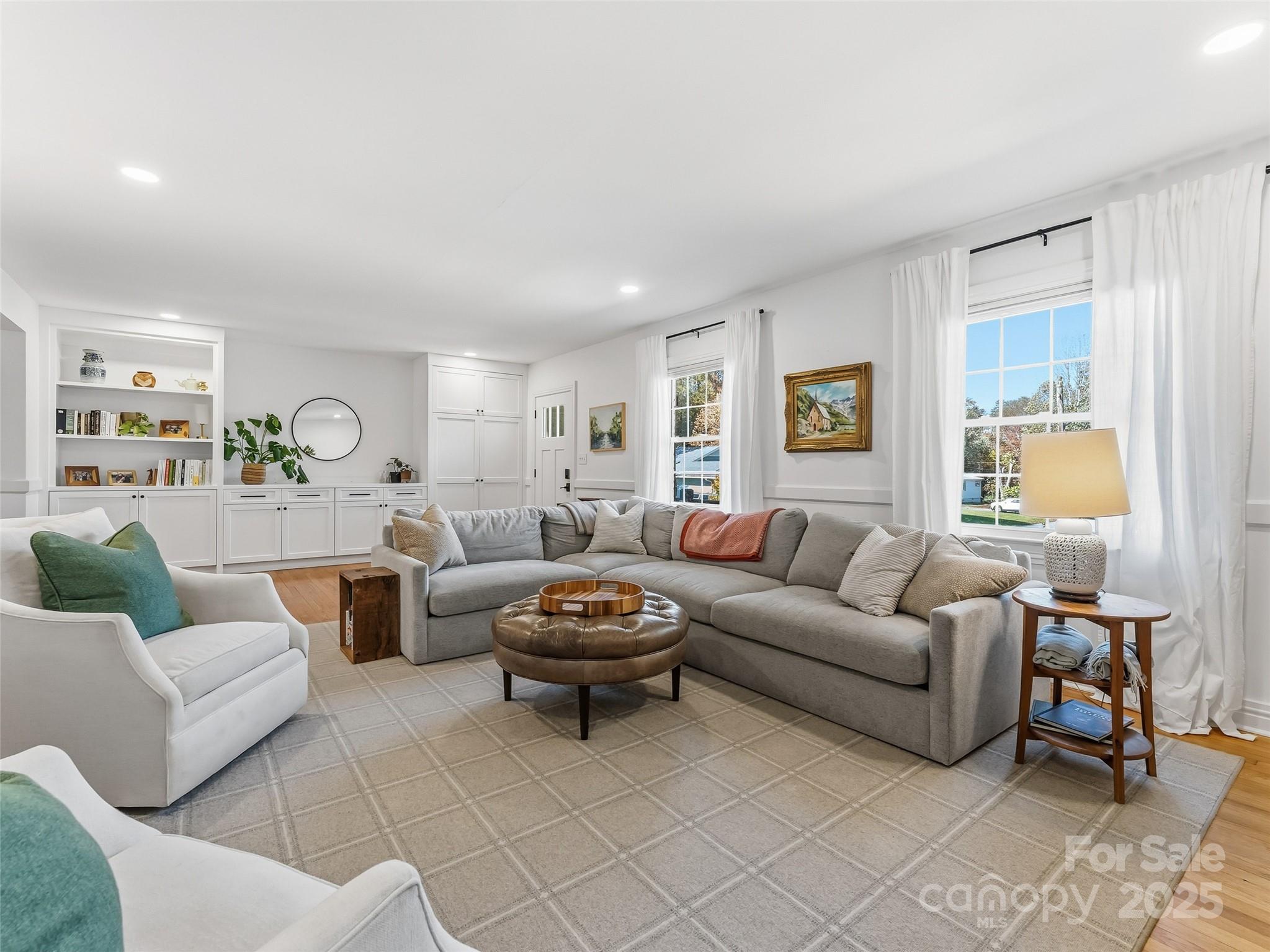140 Lakeview Avenue Brevard, NC 28712 - Photo 8 of 37 a living room with furniture and a large window