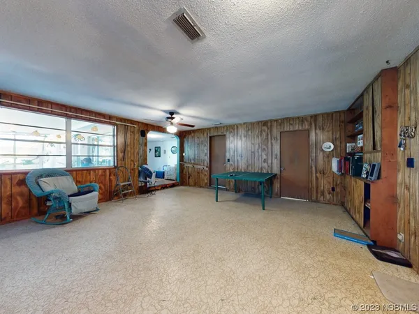 a kitchen with stainless steel appliances a refrigerator sink and cabinets