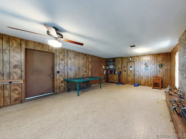 a kitchen with stainless steel appliances white cabinets and a sink