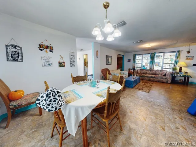 a view of storage and utility room with washer and dryer