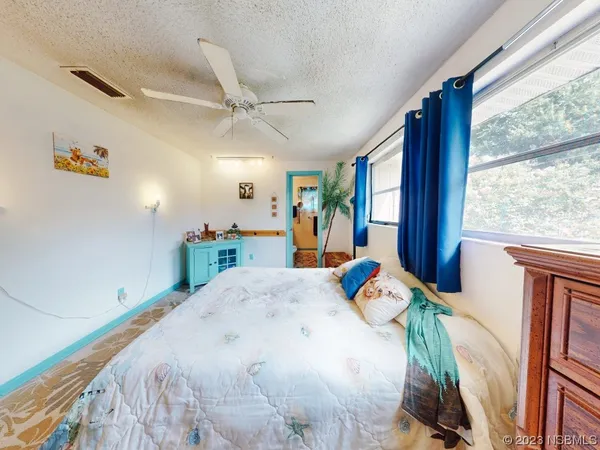 a view of a house with garden and front view of a house