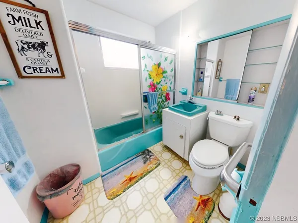 a view of a swimming pool with a yard