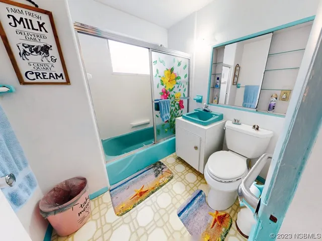 a view of a swimming pool with a yard