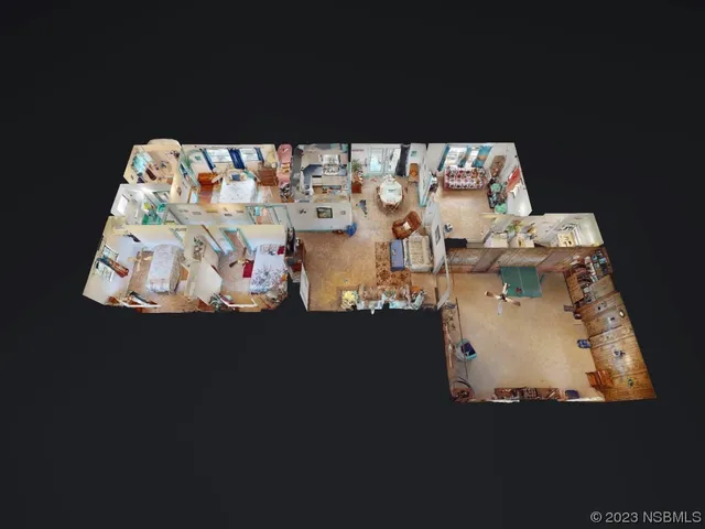 a view of a livingroom with furniture and a window