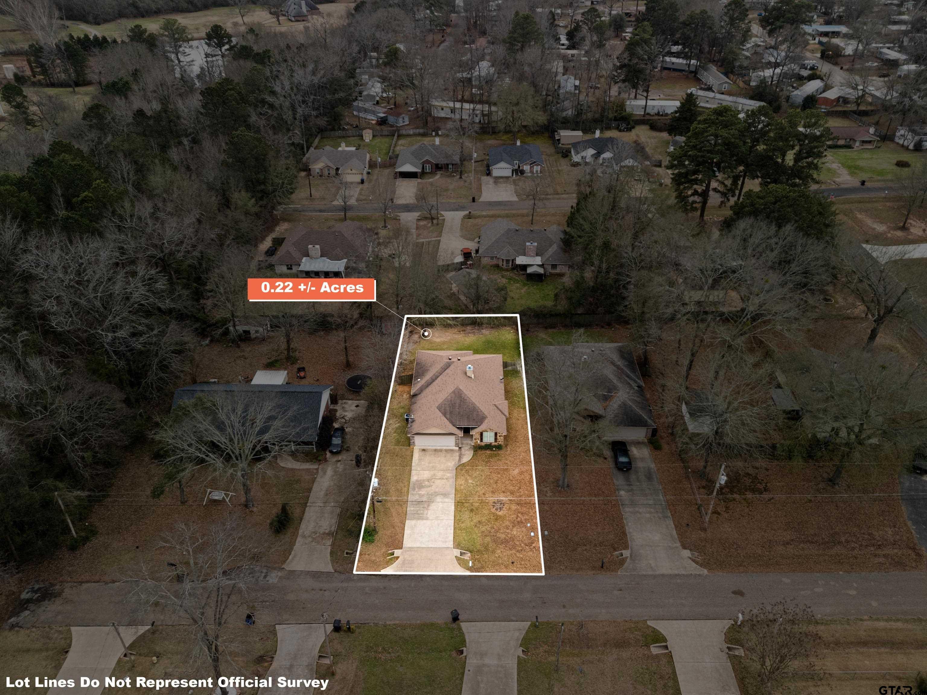 302 Collins Avenue Longview, TX 75605 - Photo 30 of 36 an aerial view of a house with a yard