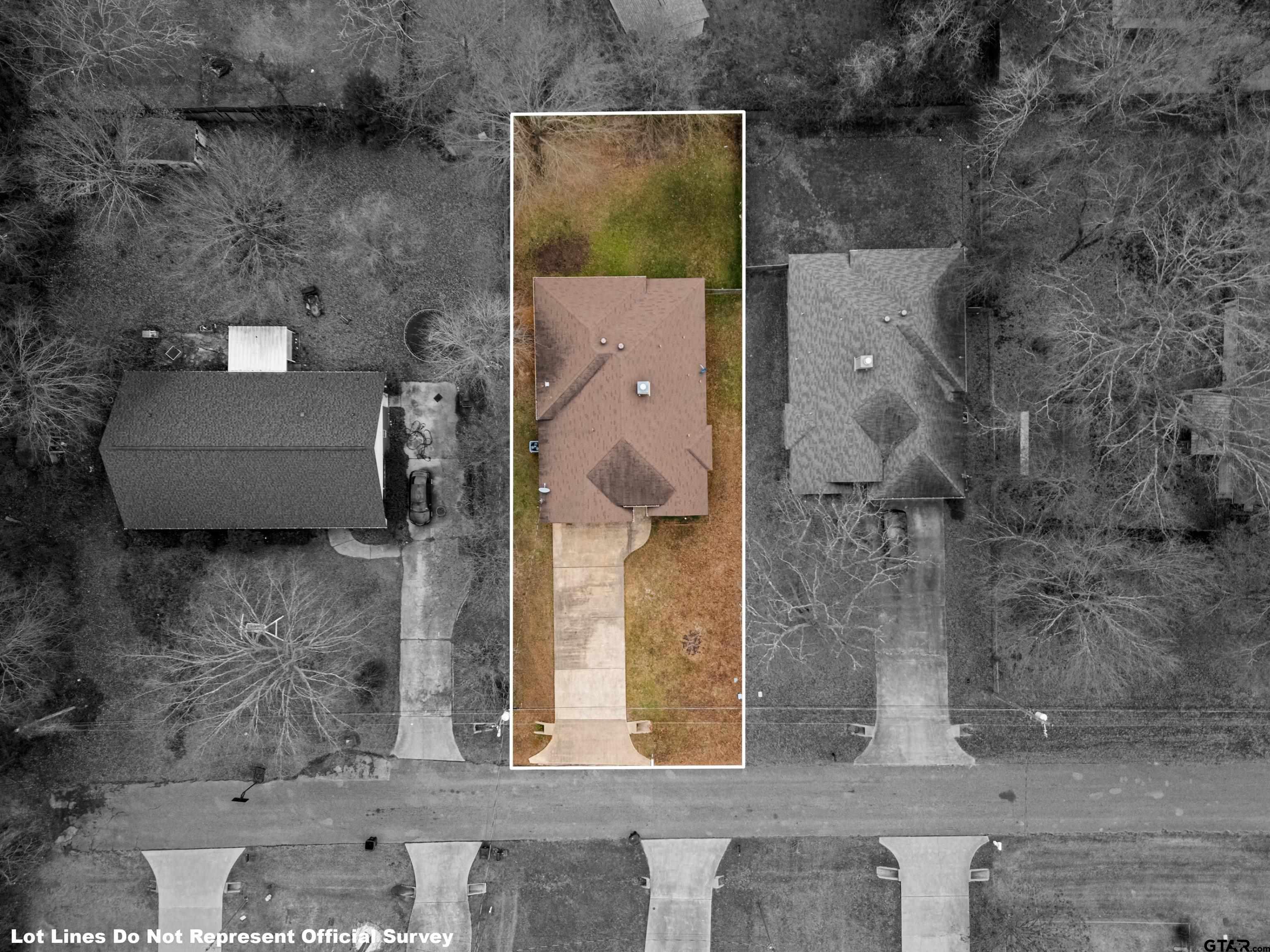 302 Collins Avenue Longview, TX 75605 - Photo 31 of 36 a bathroom with a bathtub and a shower