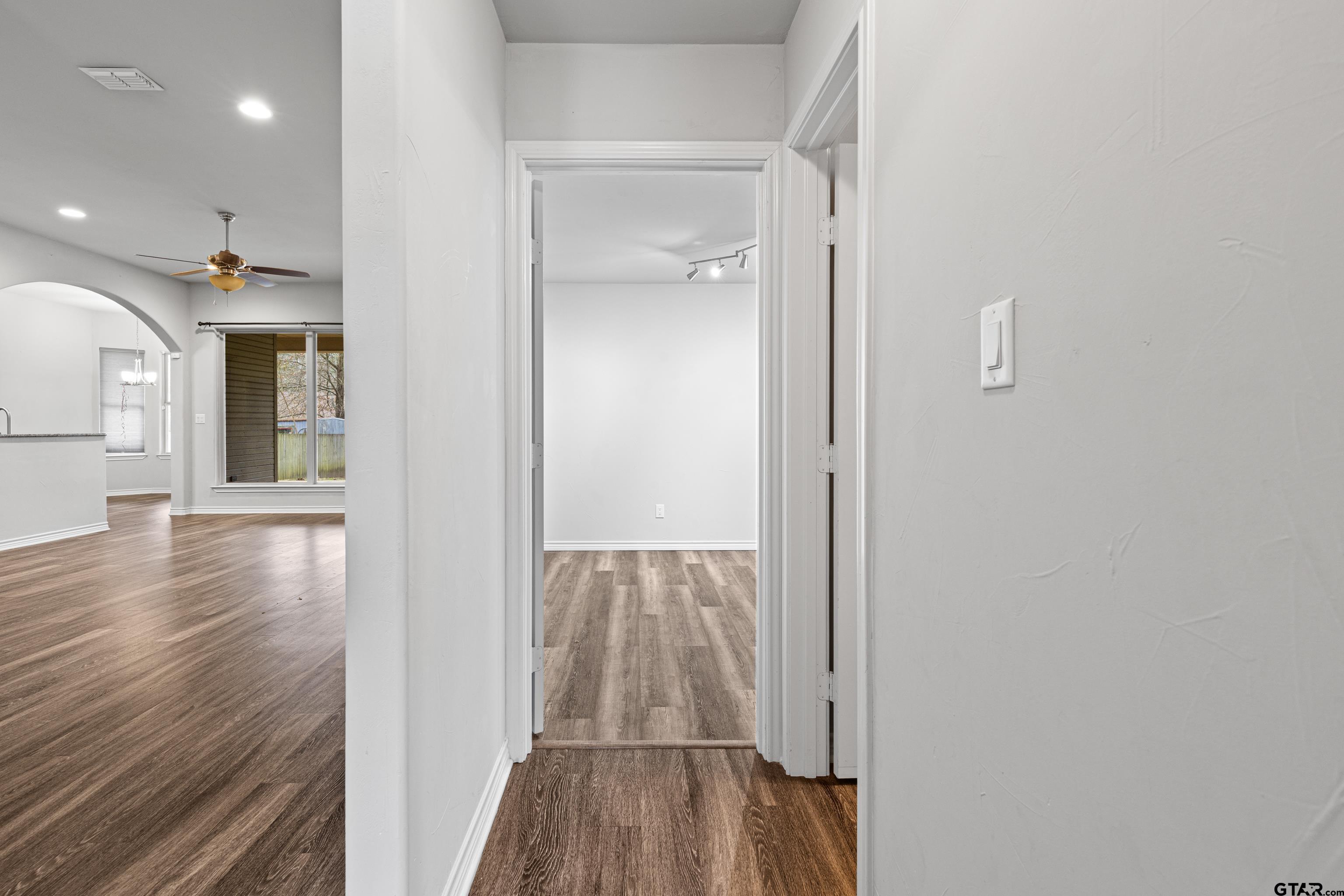 302 Collins Avenue Longview, TX 75605 - Photo 10 of 36 wooden floor with a window