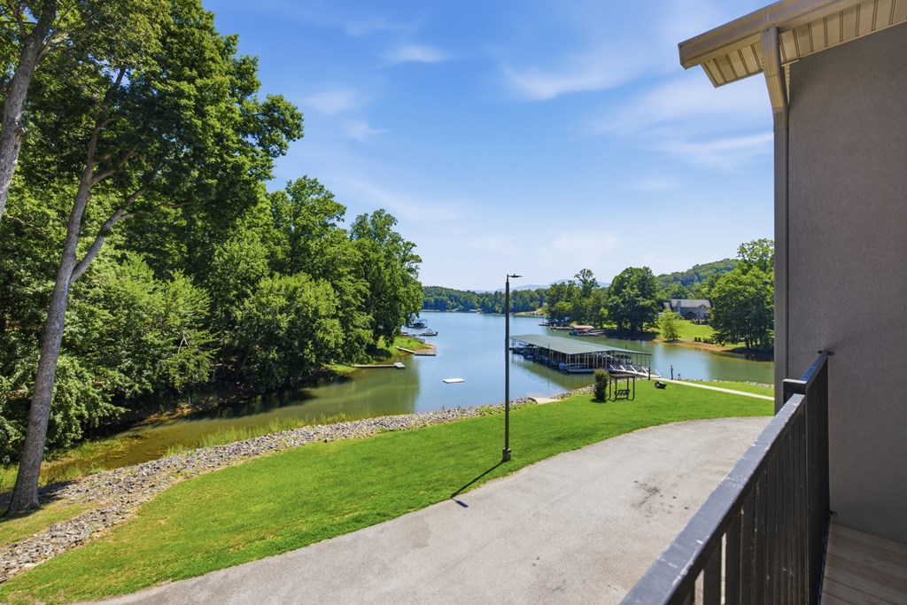 2143 Ridgecrest Circle, Unit 1 Hiawassee, GA 30546 - Photo 33 of 53 a view of a lake with a big yard